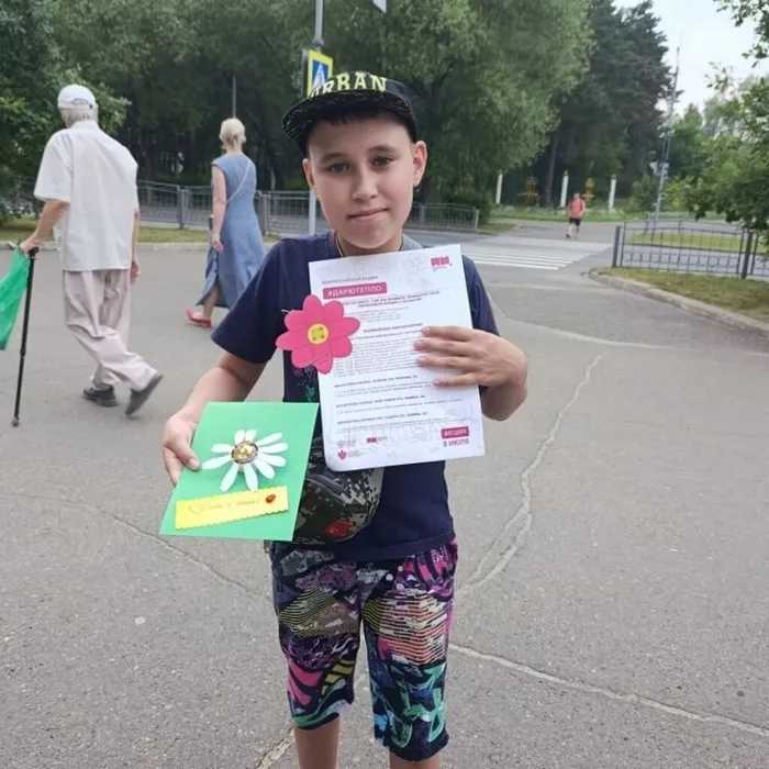 Участник акции "Дарю тепло"